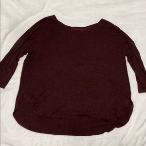 Burgundy colored women’s 3/4 sleeve top